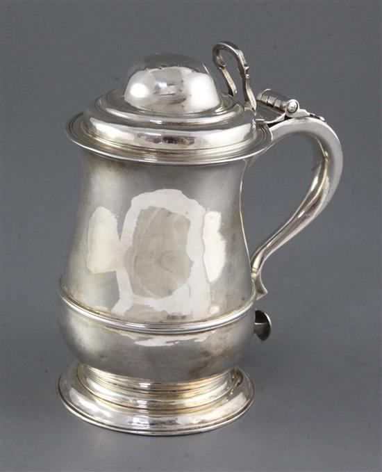 A late George II silver tankard by Samuel Wood, 18 oz.